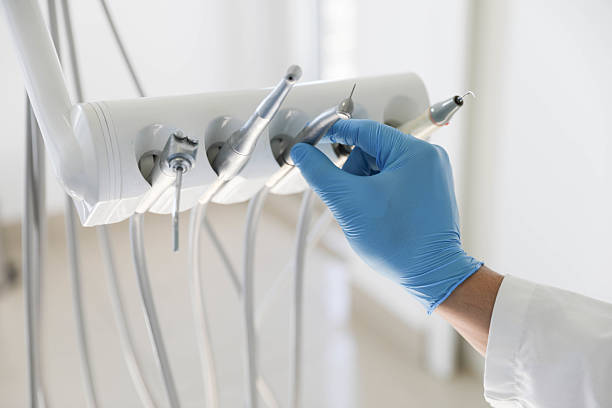 Professional Emergency Dentist technician working in Painted Post, NY